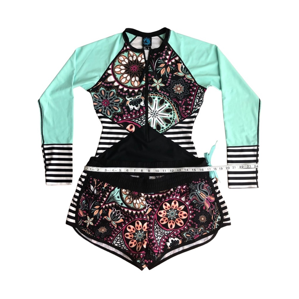 Wave Life One piece Swimsuit with matching shorts. Preowned, minor tear n wear